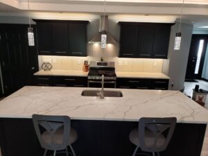 modern black and quartz kitchen photo of kitchen